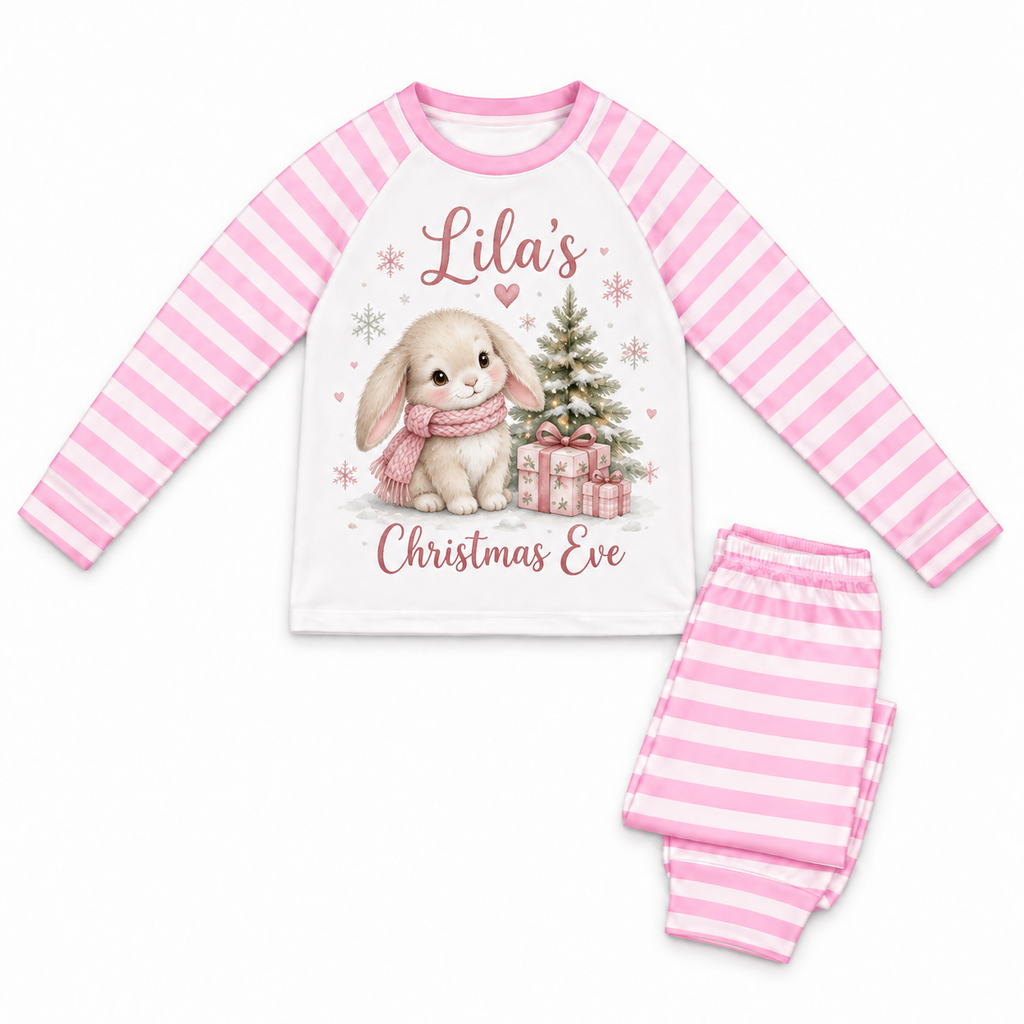 Pink stripe long pyjamas personalised Lila’s Christmas Eve with a winter bunny, tree and gifts on a white background.