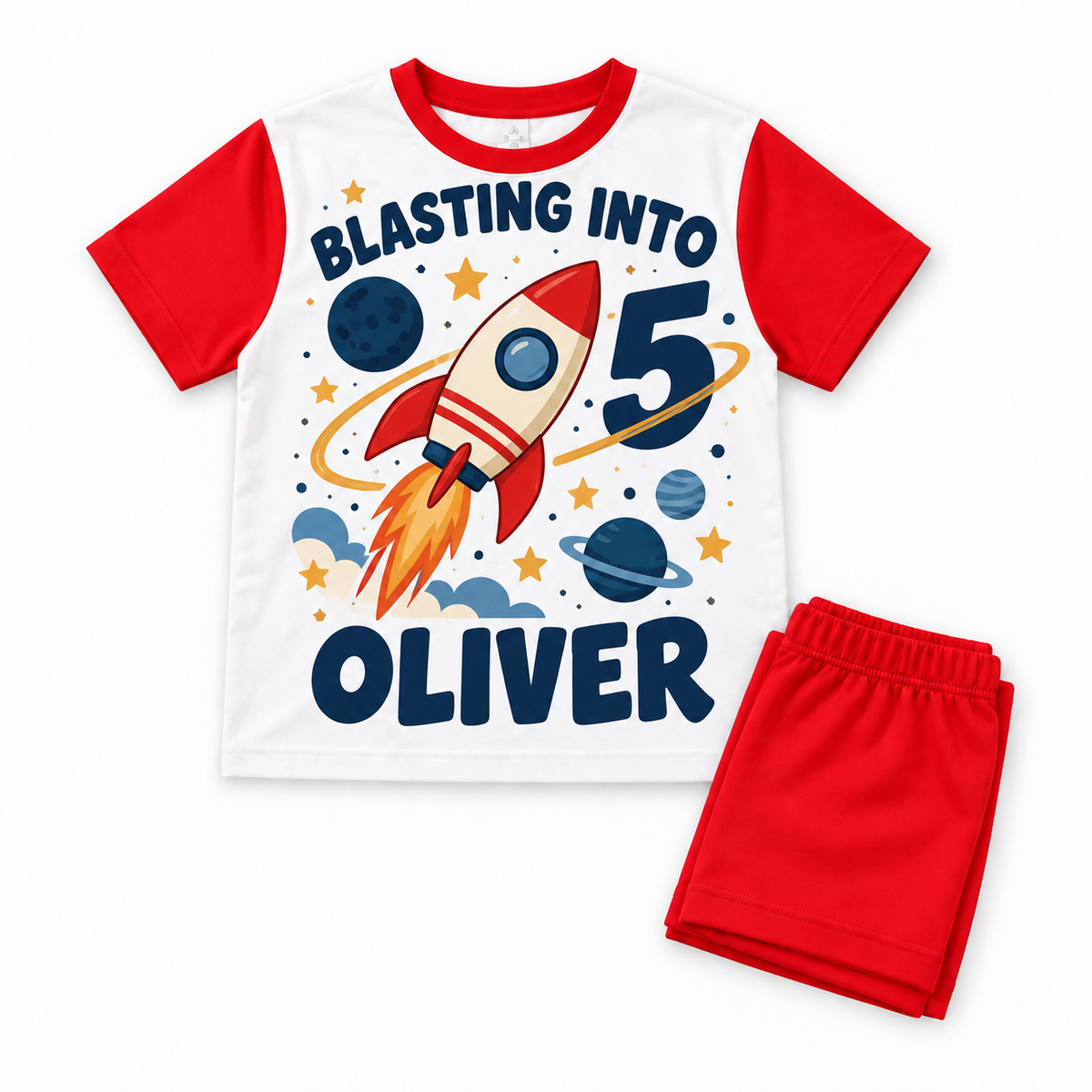 Red shorts birthday pyjamas with a rocket and planets, reading Blasting Into 5 and Oliver, on a white background.