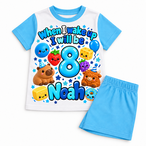 Aqua Blue Shorts squishy birthday pyjamas with blue and navy lettering, Noah age 8